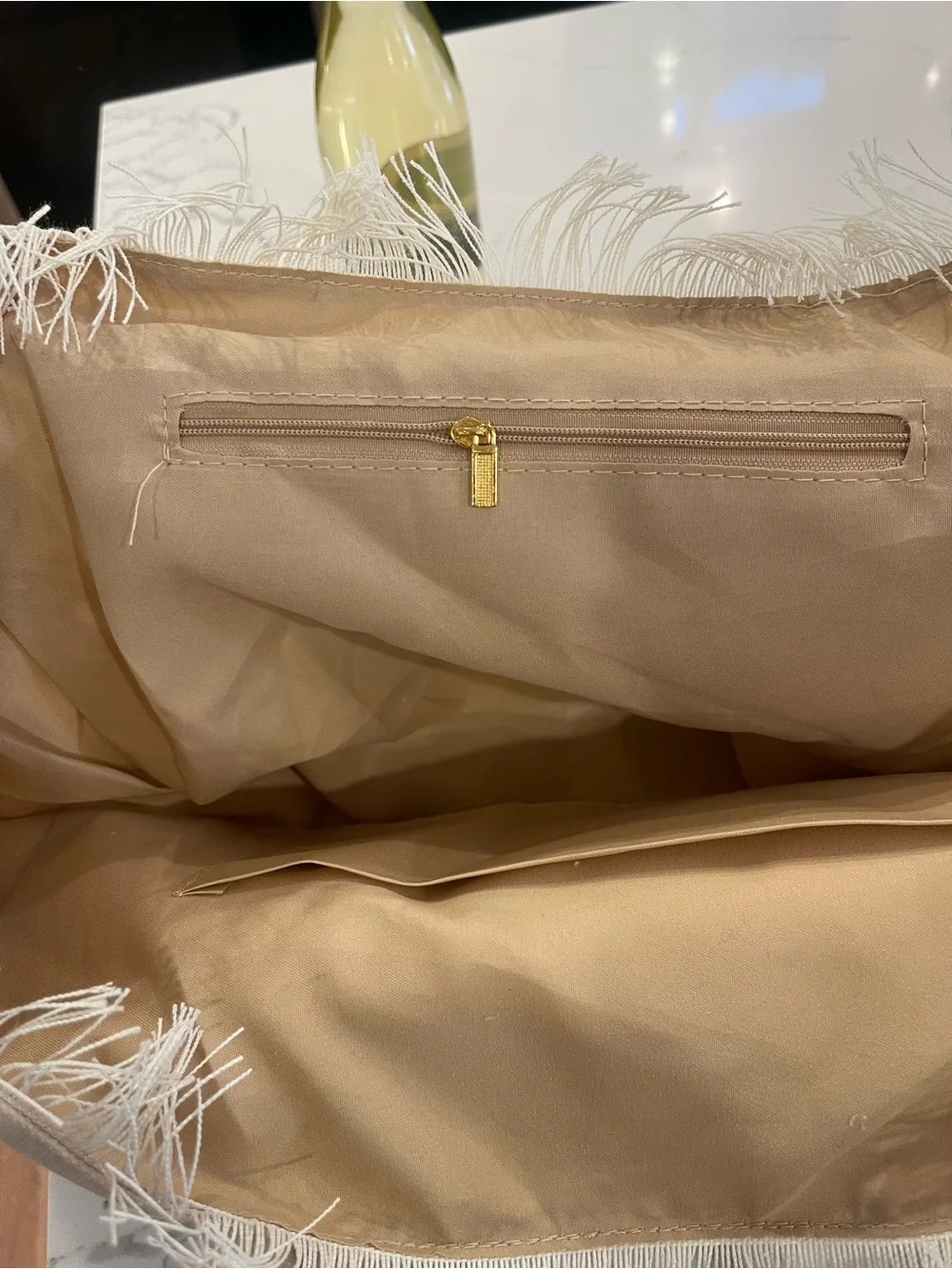 Dolce Vita Cream Canvas Fringe Tote with Light Blue Logo